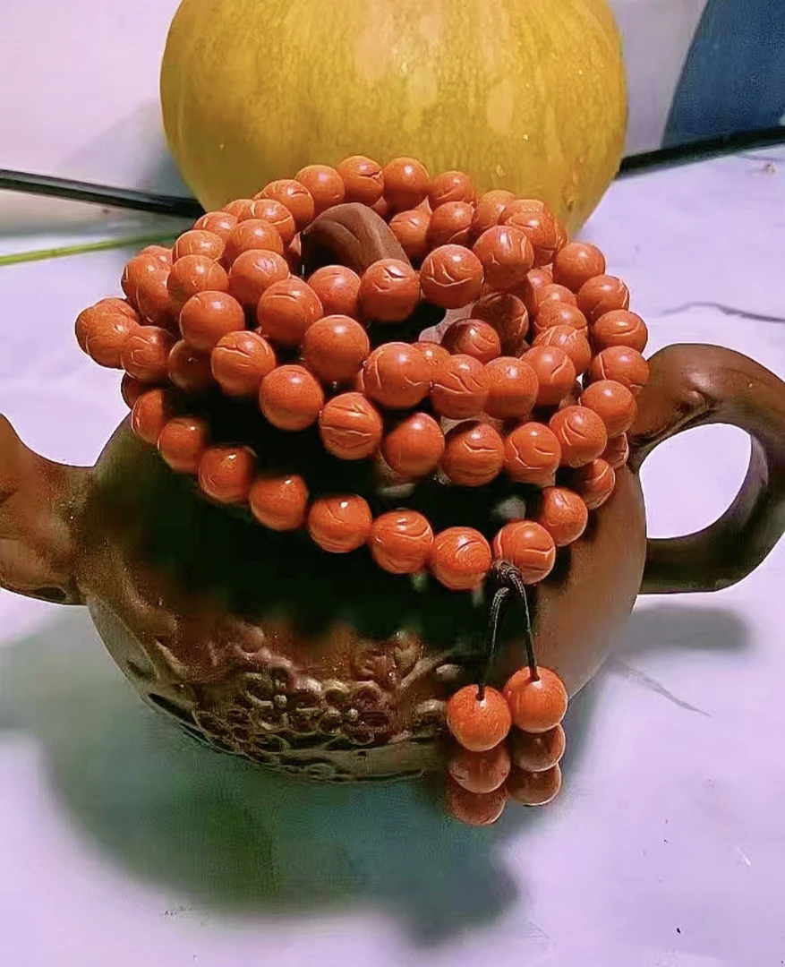 秦岭秦岭龙纹野生桃核 9+小尺寸正圆红魔脖挂 108颗 无着色无泡药