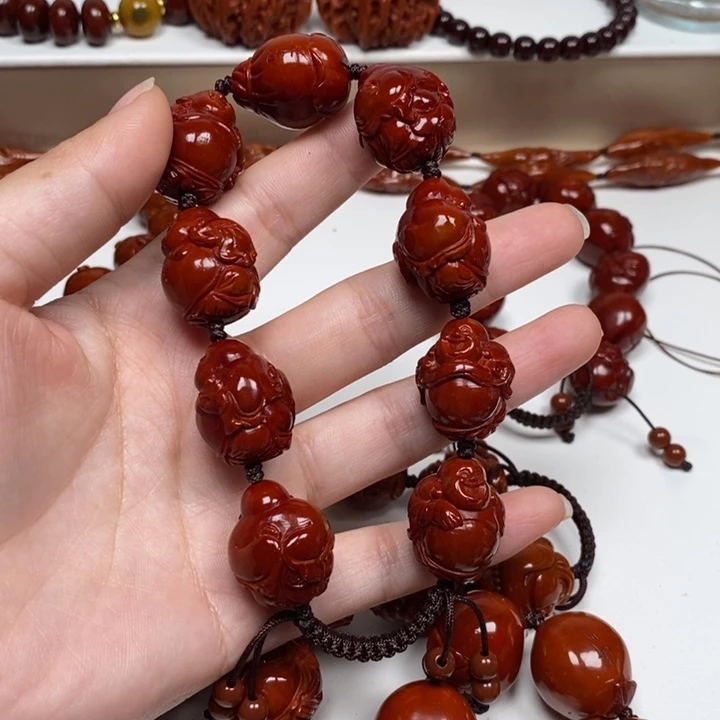 F***）橄榄核雕刻工艺的发展