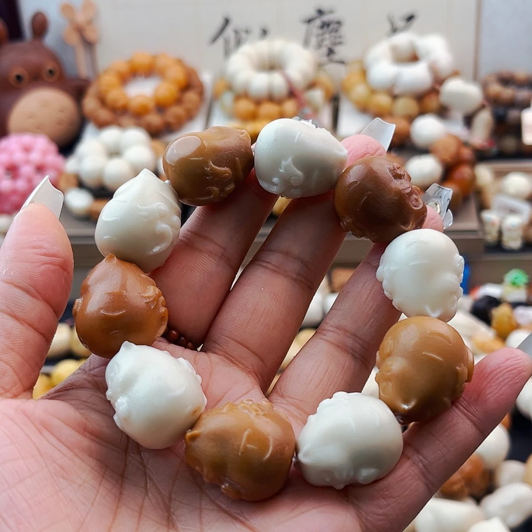 菩提根/象牙果手串可**琪龙猫微瑕八折