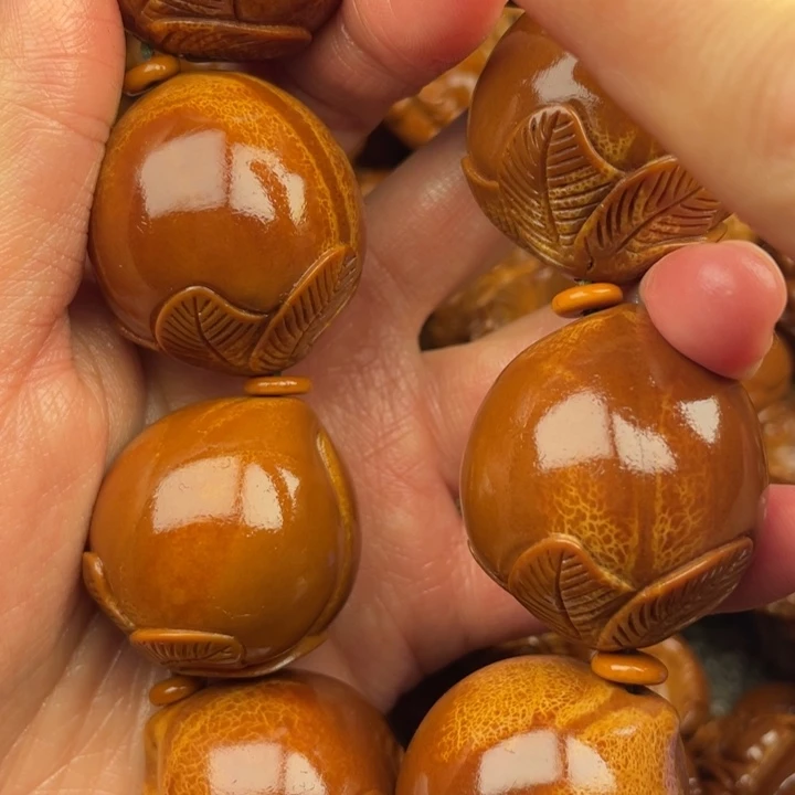 橄榄核吊坠兜***钱橄榄核手持