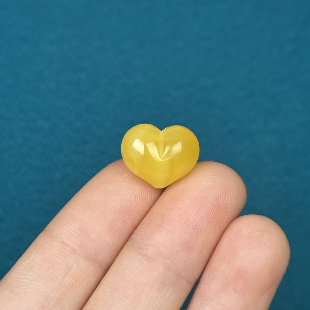 F4376天然原矿蜜蜡 屁桃爱心 14.2*11.7*9.7mm支持复检假一罚十