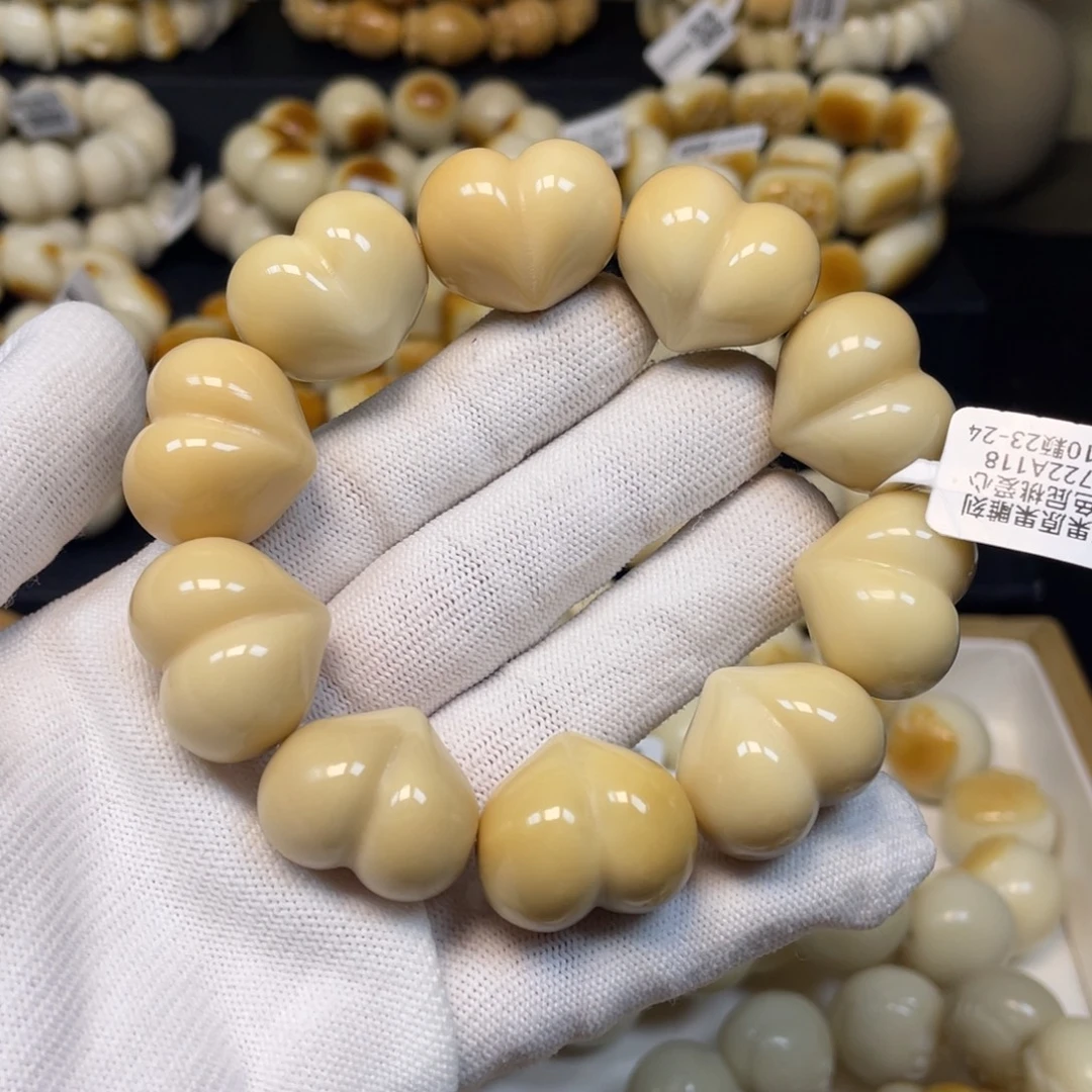 吊坠菩提根/象牙果115爱心屁桃