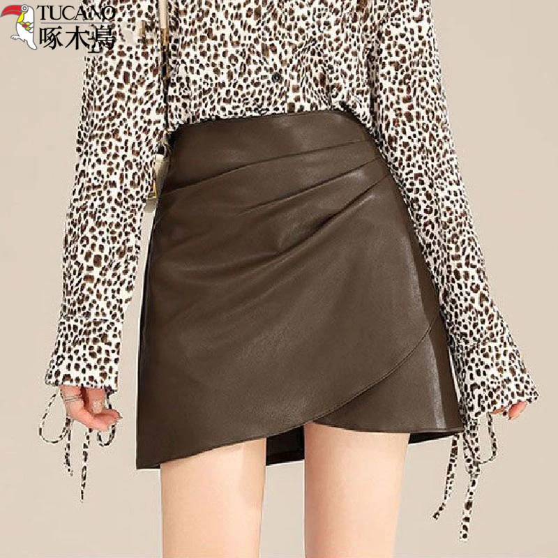 啄木鸟秋冬PU皮裙半身裙女款2025新款气质高腰显瘦a字包臀裙短裙