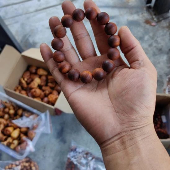 每***畅1.5毛珠子一条，黑油陈华料