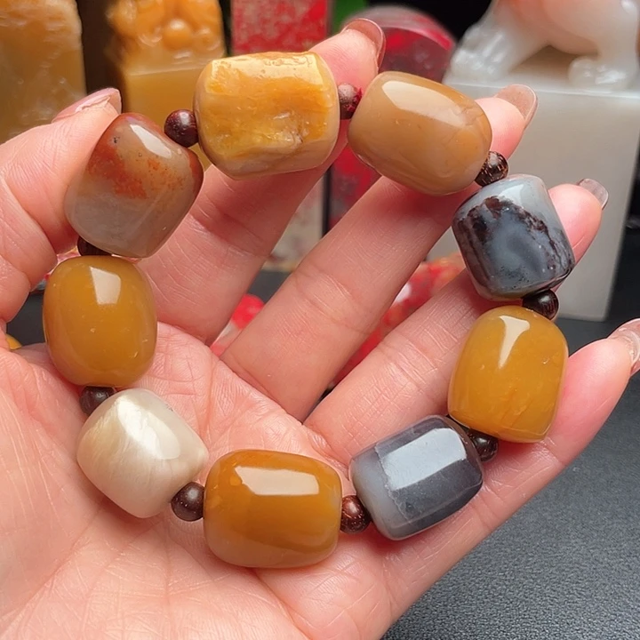 田黄石妳****6田黄石手把件手串