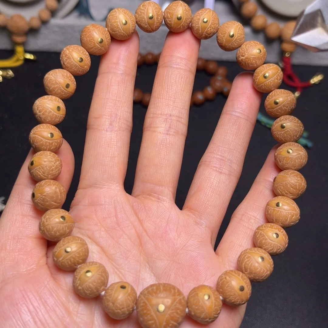 凤眼菩提吊坠12mm铜丁27颗精品手持