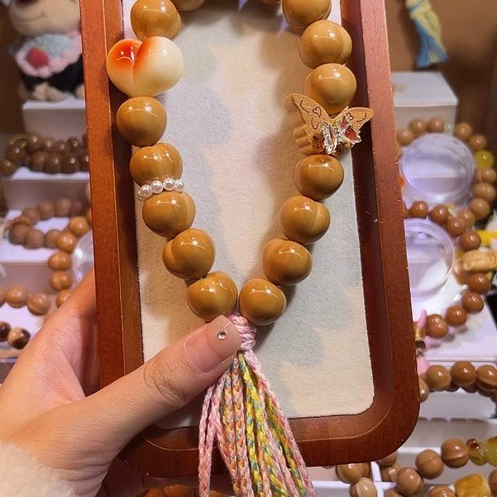 吊坠猴头核桃17+奶油屁桃手持设计款