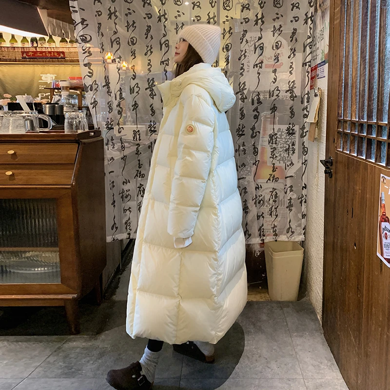 蓝海奕诺连帽过膝鹅绒服外套冬季新款韩版宽松过膝长款羽绒服女装