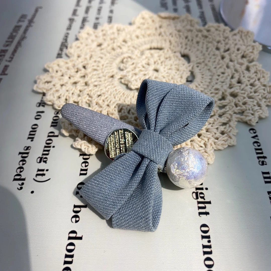 A88蓝色蝴蝶结猪猪鸭夹