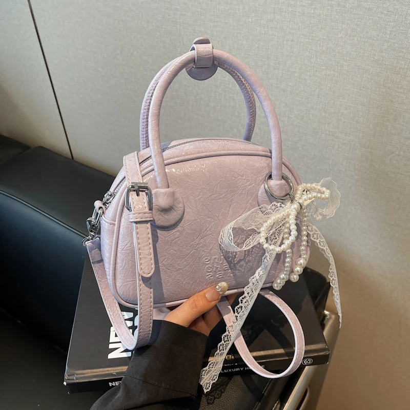 高级感包包女春夏百搭2025新款时尚斜挎包休闲手提波士顿保龄球包