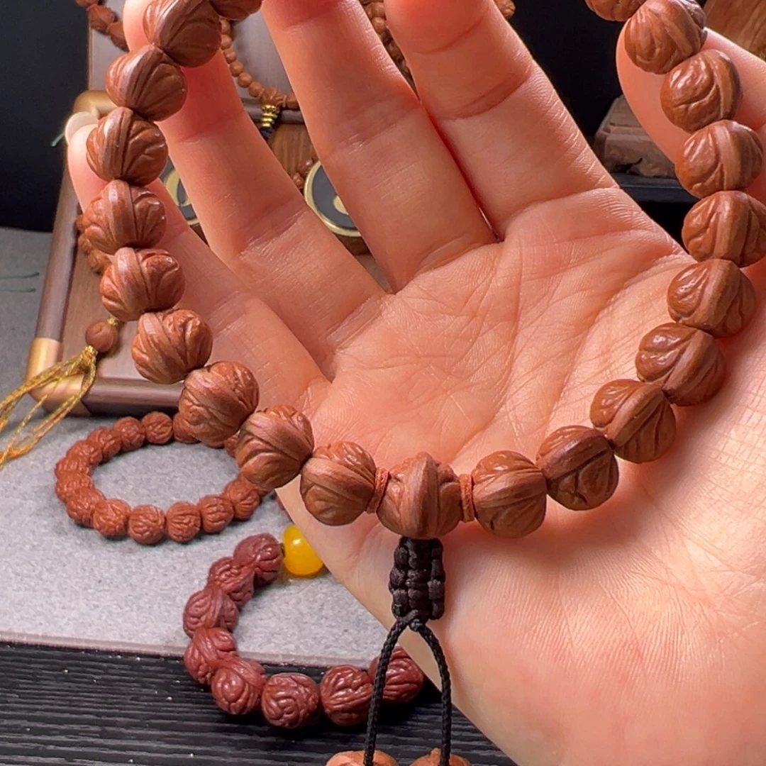 用***8吊坠桃核12野生玉麒麟