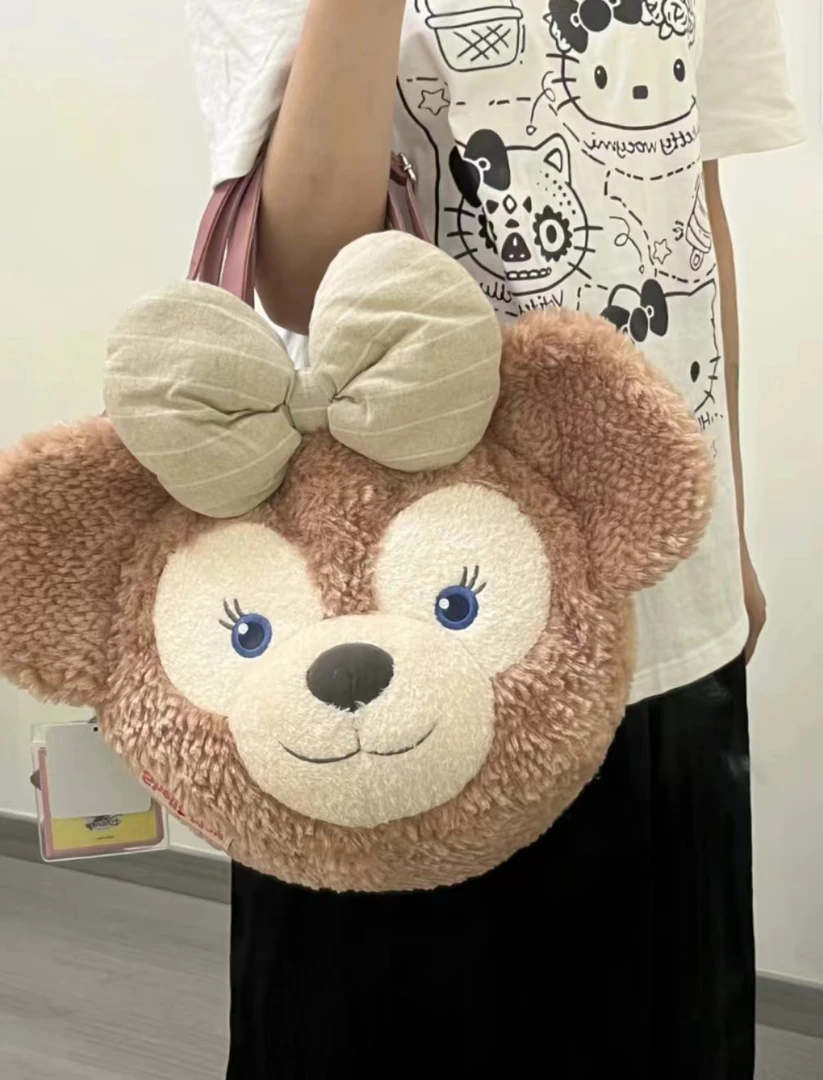 港迪平替高版雪莉玫大头包大脸包毛毛斜挎包包jk背包手提包女生