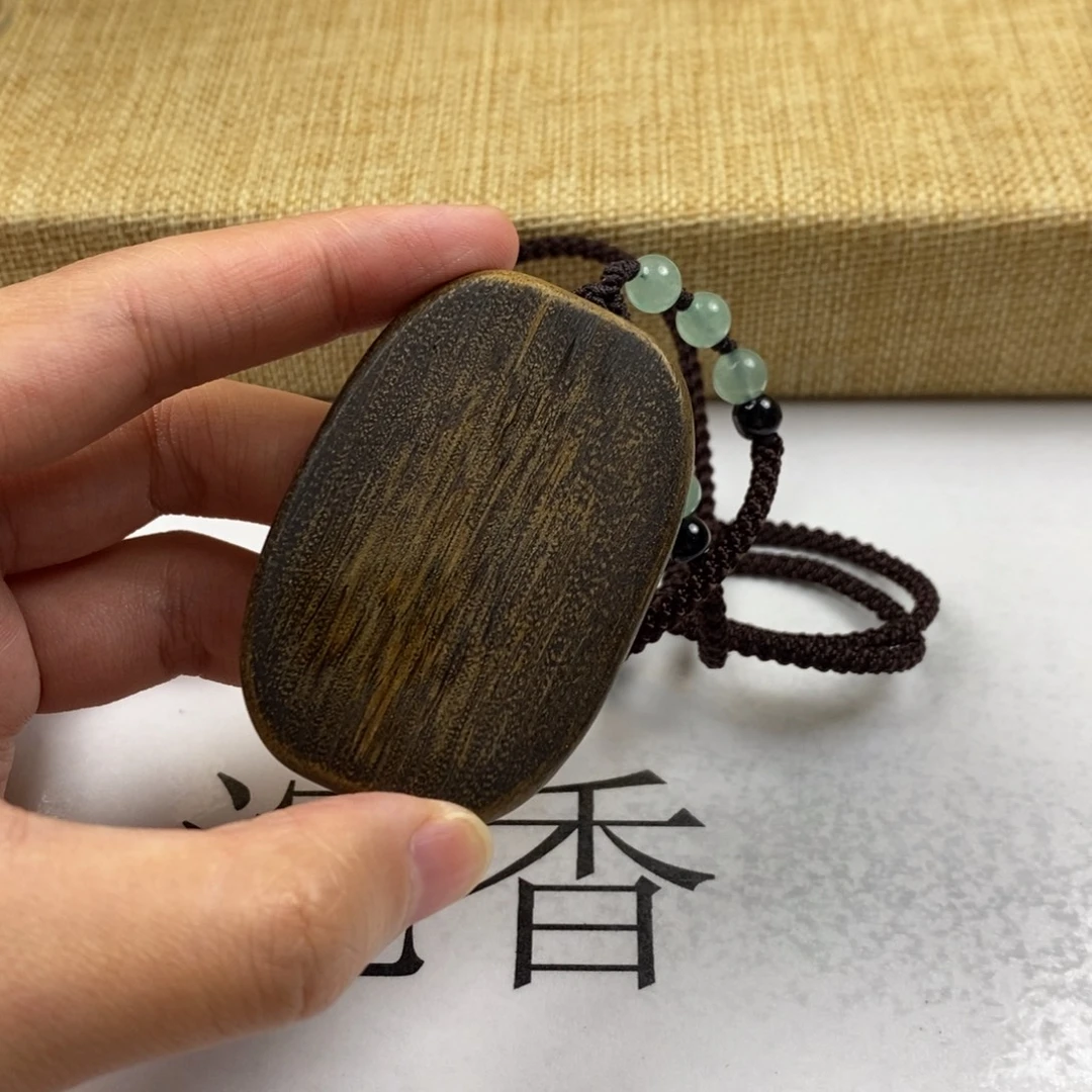 木***易沉香吊坠文莱无事牌