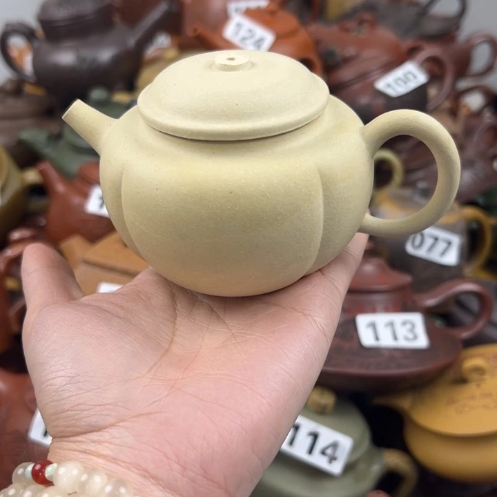 紫砂茶壶钮掉里面裂