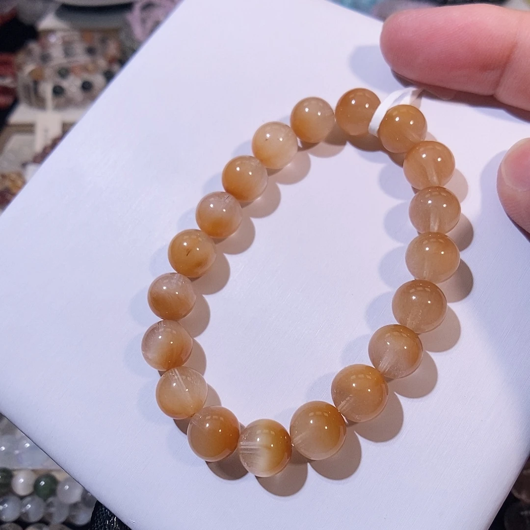 水晶手串未镶嵌橘兔毛9mm