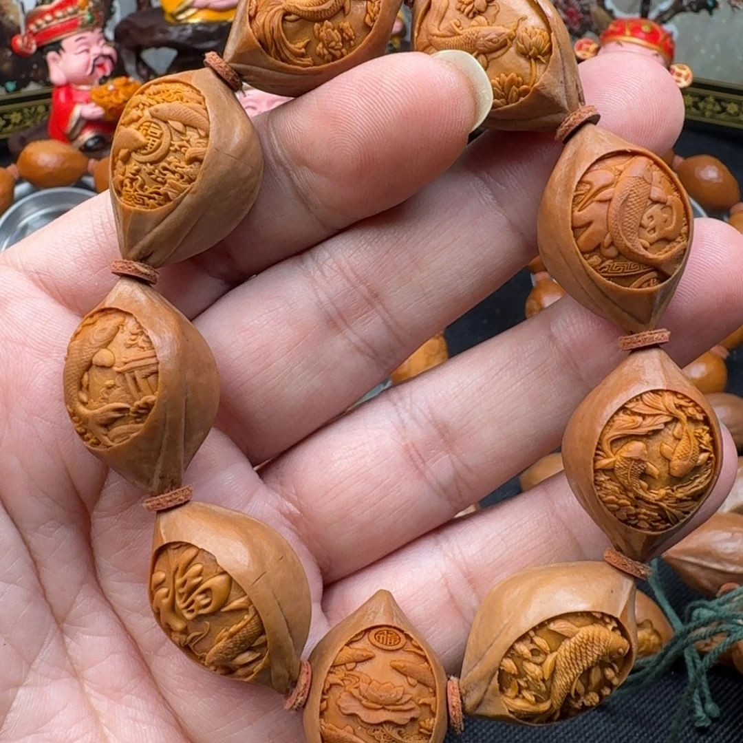 江***先橄榄核手串/手链鱼