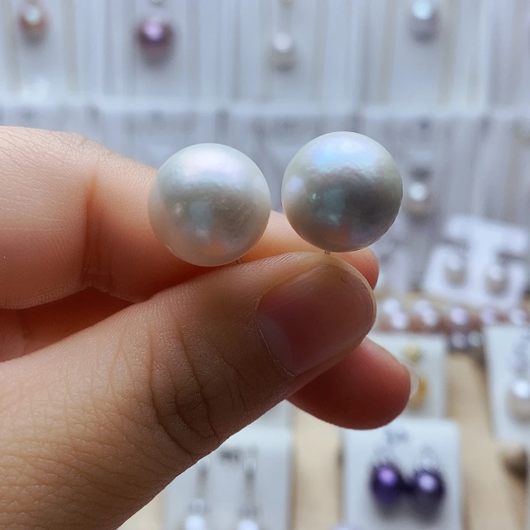 淡水珍珠耳饰银S925镶嵌左*?