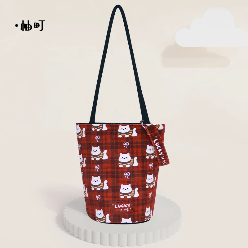 柚町X格子小呆卡通文艺大容量通勤水桶包个性简约帆布包女