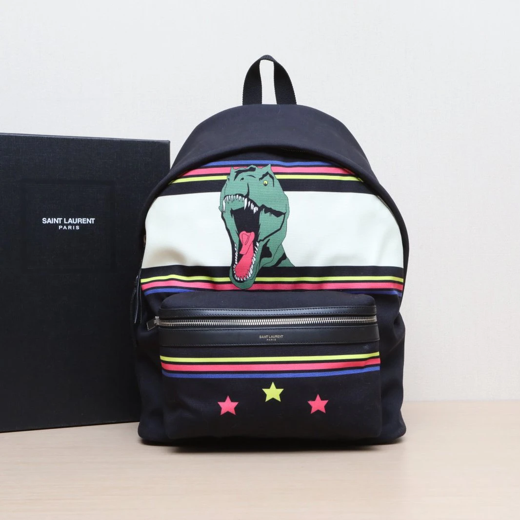 99新 YSL/圣罗兰 花花 黑色 帆布 恐龙 印花 双肩包