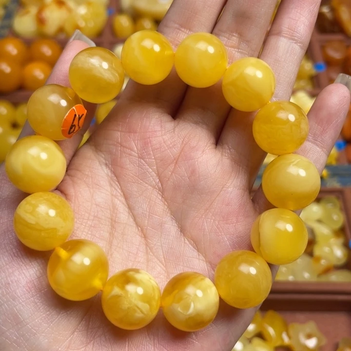蜜蜡未镶嵌珠宝奇石天然原矿鸡油黄飘花圆珠手串微微瑕