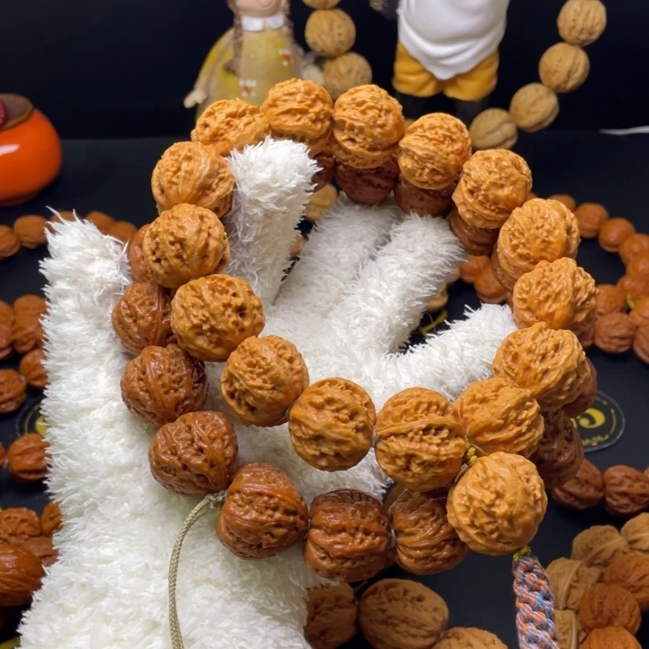 胖***n手串文玩核桃珊瑚，八爪龙鳞