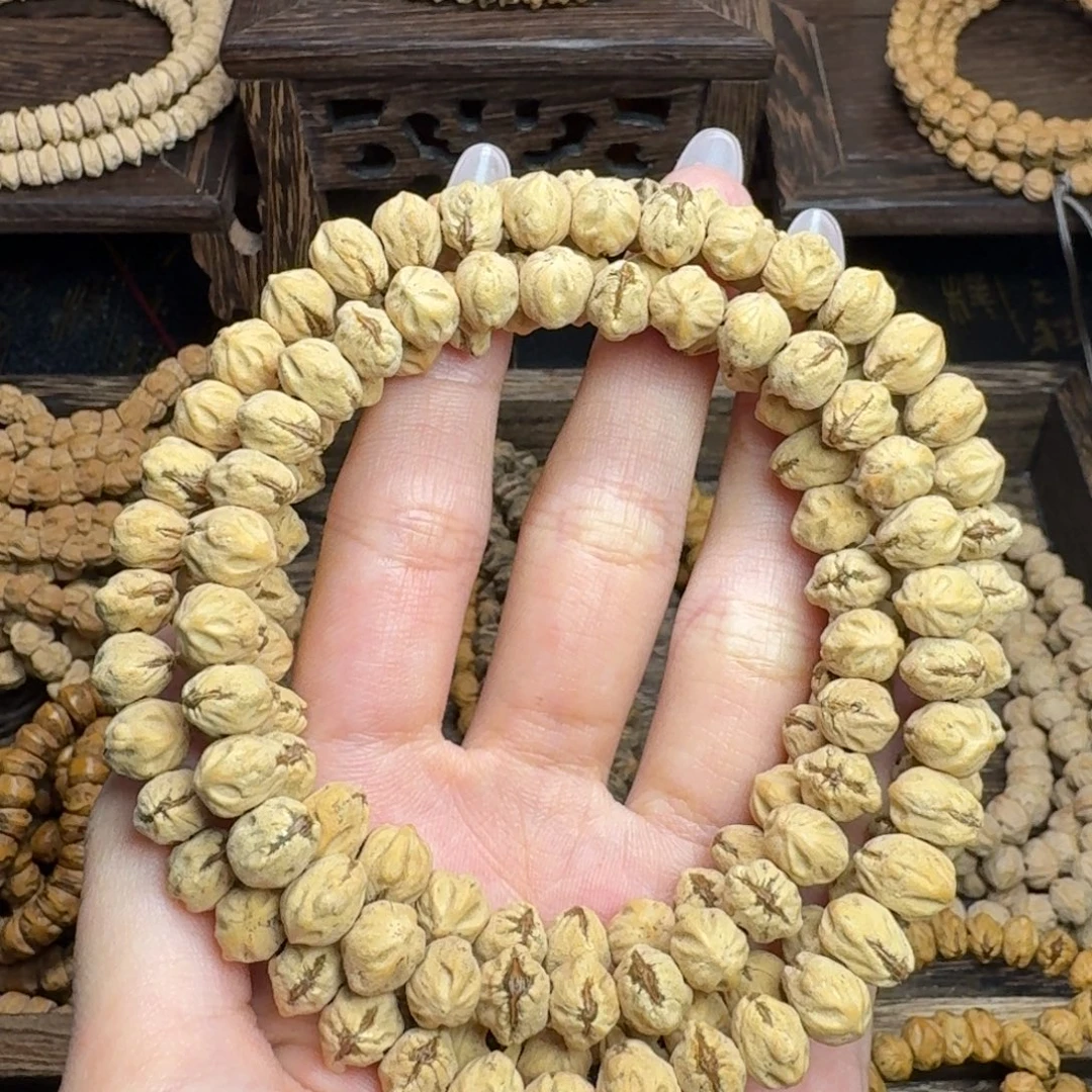 柏香籽/百香籽手串热振粉皮红芽