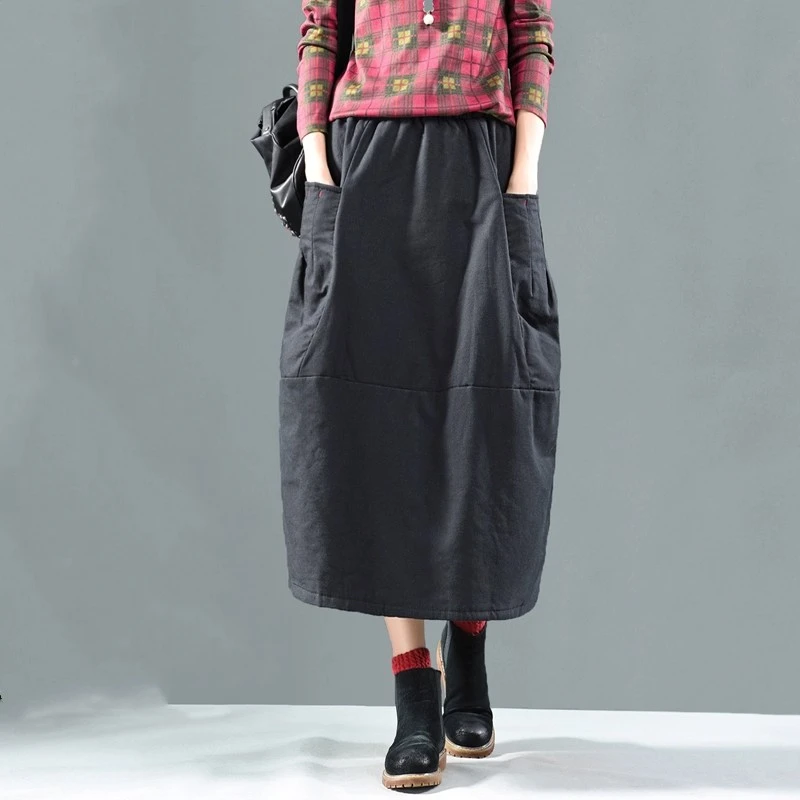 宽松双口袋黑色夹棉裙子百搭减龄遮肉中长款松紧腰a字半身裙女式