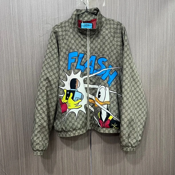 99新 GUCCI/古驰 99新Gucci古驰唐老鸭满印夹克 尺码：48