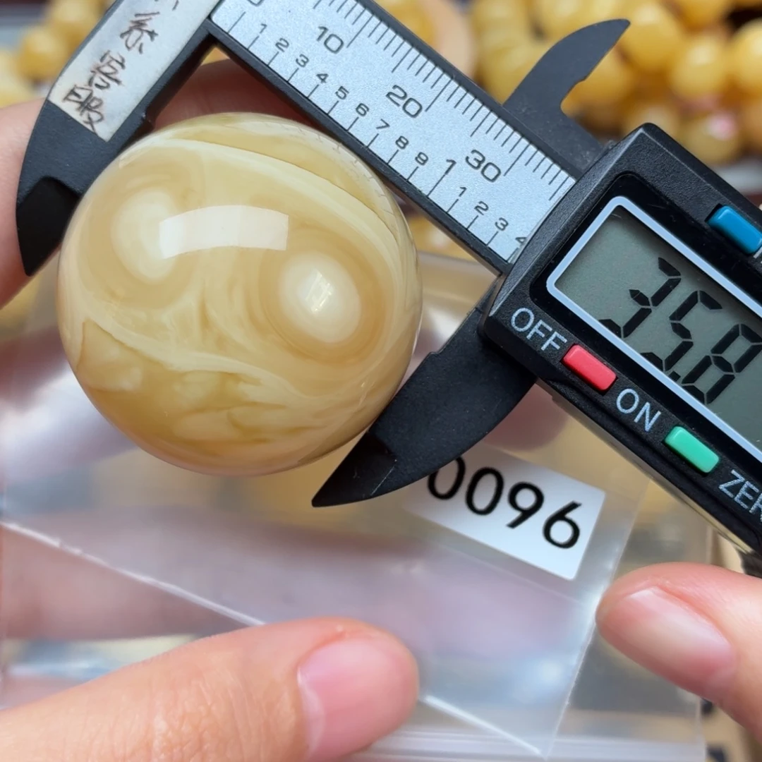 爱***糖琥珀未镶嵌裸石蜜蜡微瑕