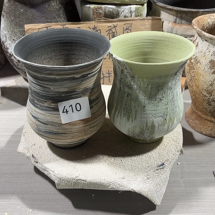 摆件陶高15，内口8.5 有孔，410