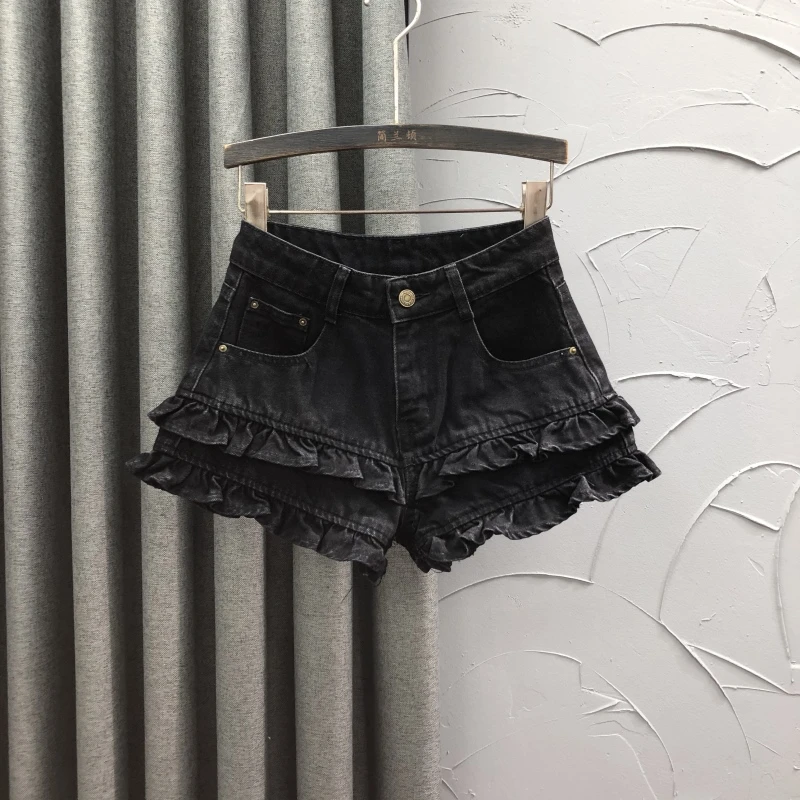 黑色高腰潮流牛仔短裤女2025夏天时尚个性减龄A字木耳边阔腿热裤