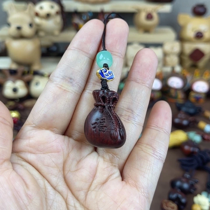 紫檀木福袋手机链一个