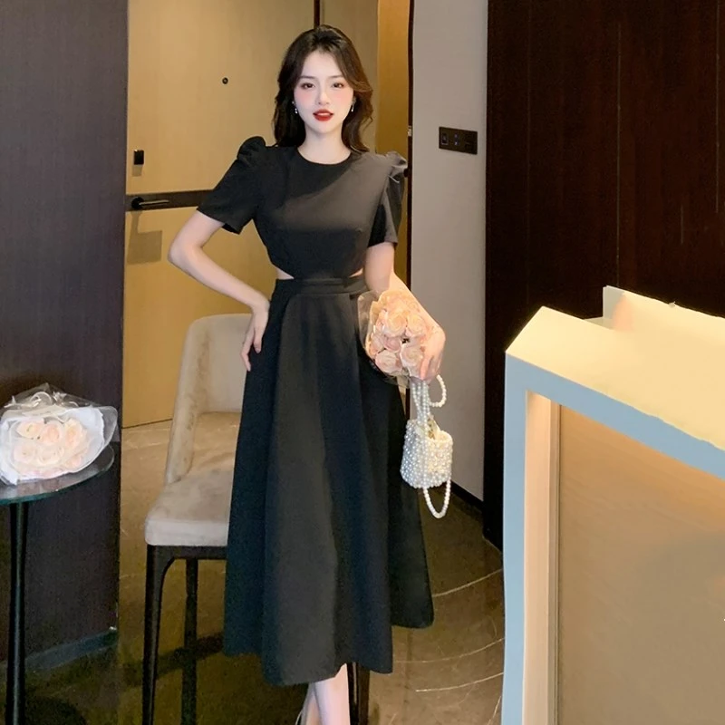 维多利亚设计感后腰镂空别致字连衣裙夏季新款法式泡泡袖修身圆领