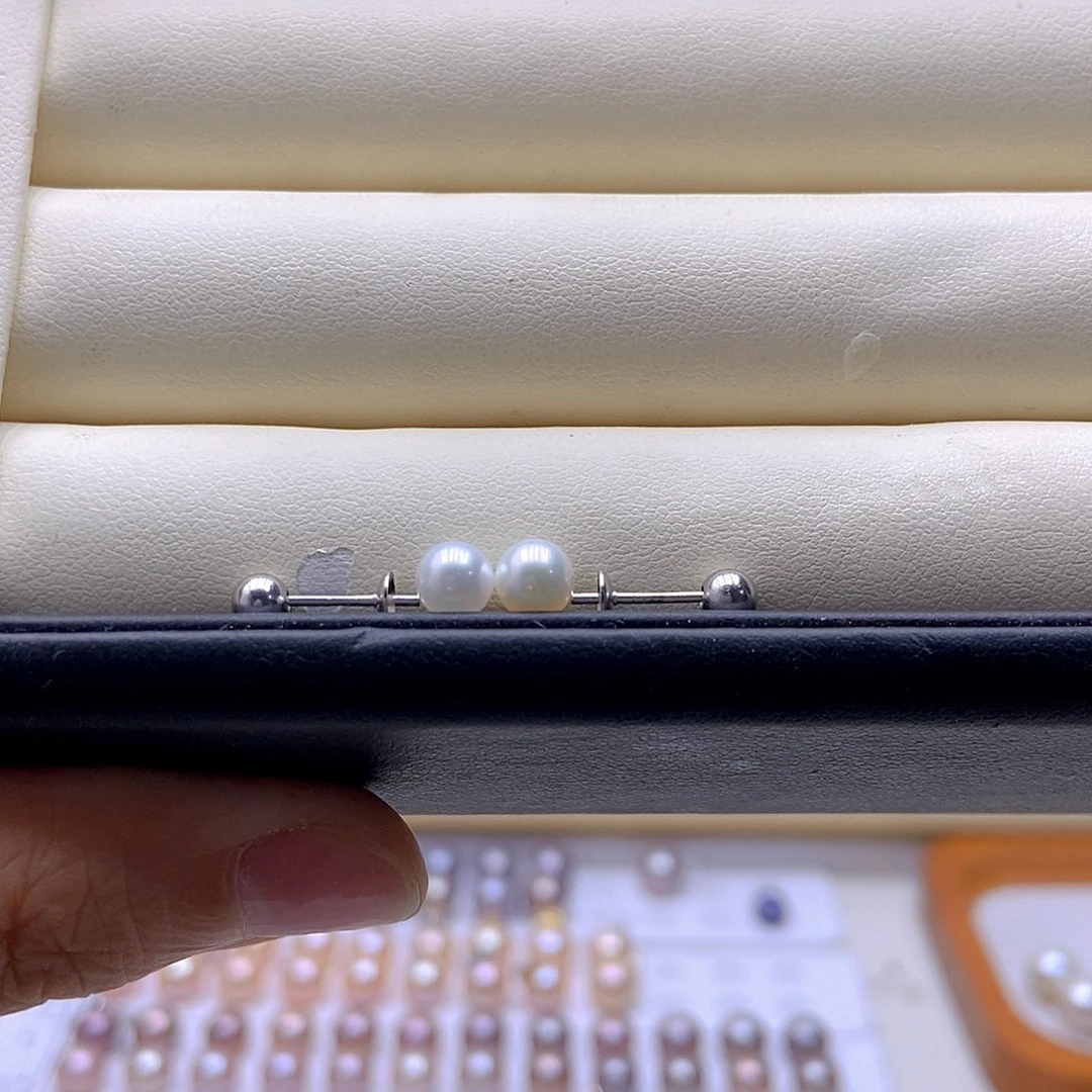 咸***煲淡水珍珠银S925镶嵌耳钉