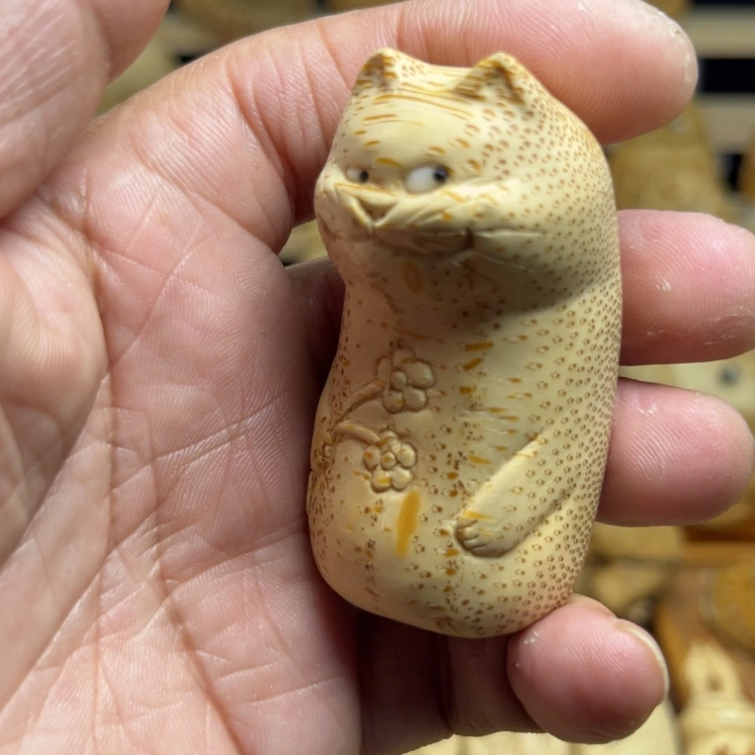 香榧木竹根雕猫咪手把件