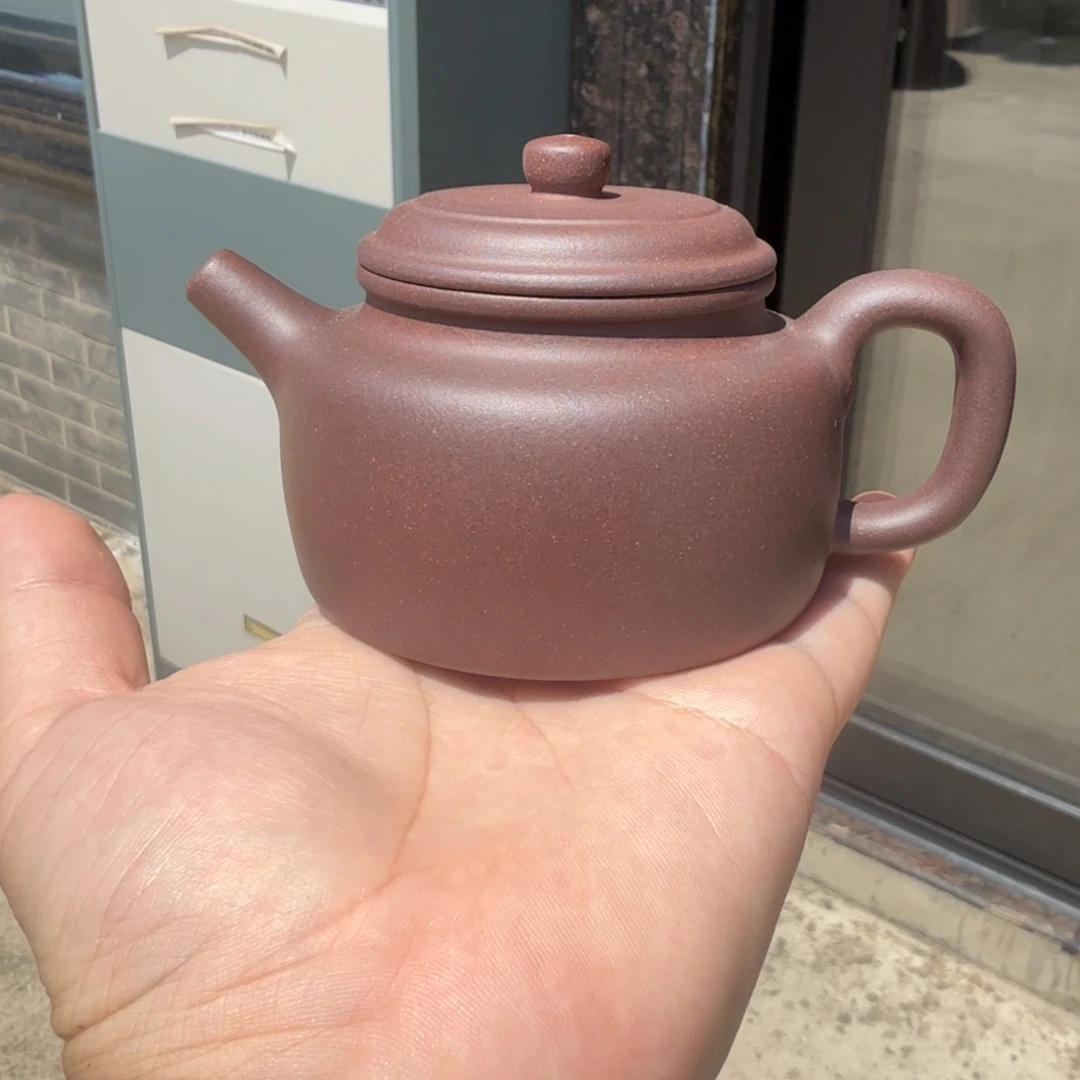 茶杯紫砂微瑕的壶