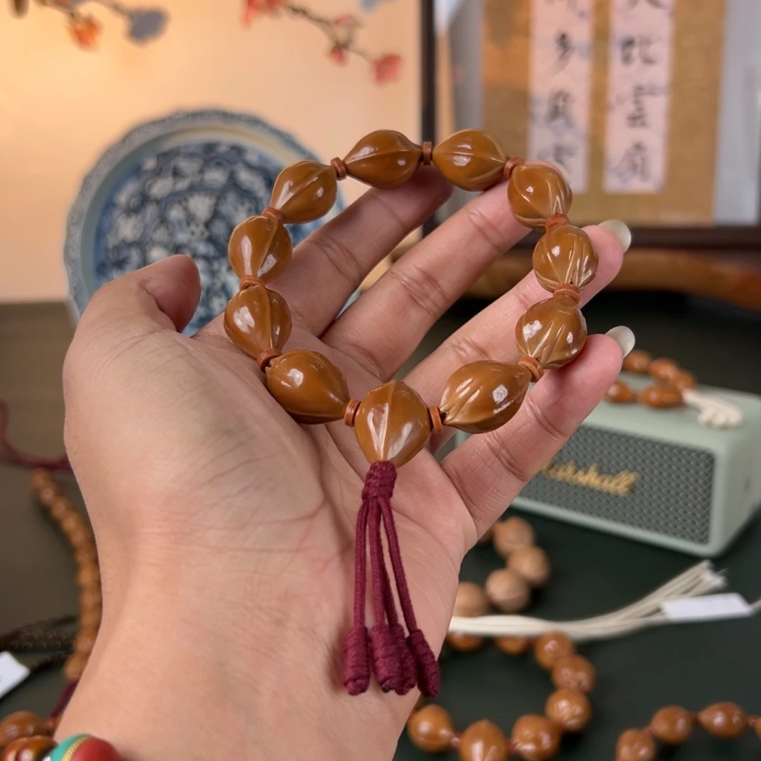 -***修橄榄核手串1523三面佛