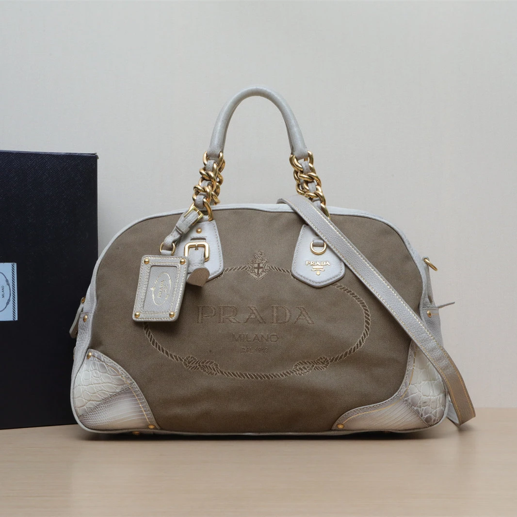 95新 Prada/普拉达 【小花黑黑】 拼色 帆布 流苏 保龄球包