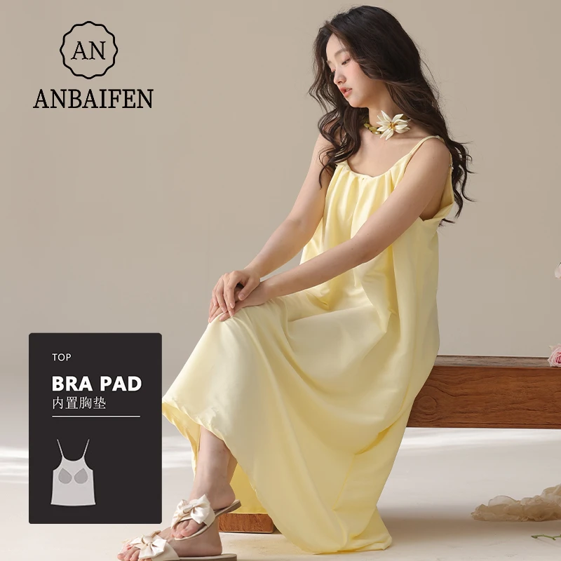 海边度假风夏季带胸垫睡裙女性感吊带柠檬黄圆领宽松沙滩裙中长款