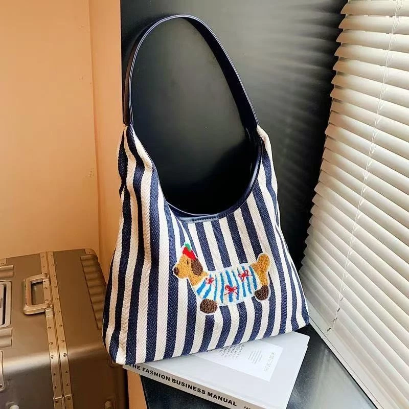 2025新小众腊肠狗托特包包韩系学院风学生通勤百搭刺