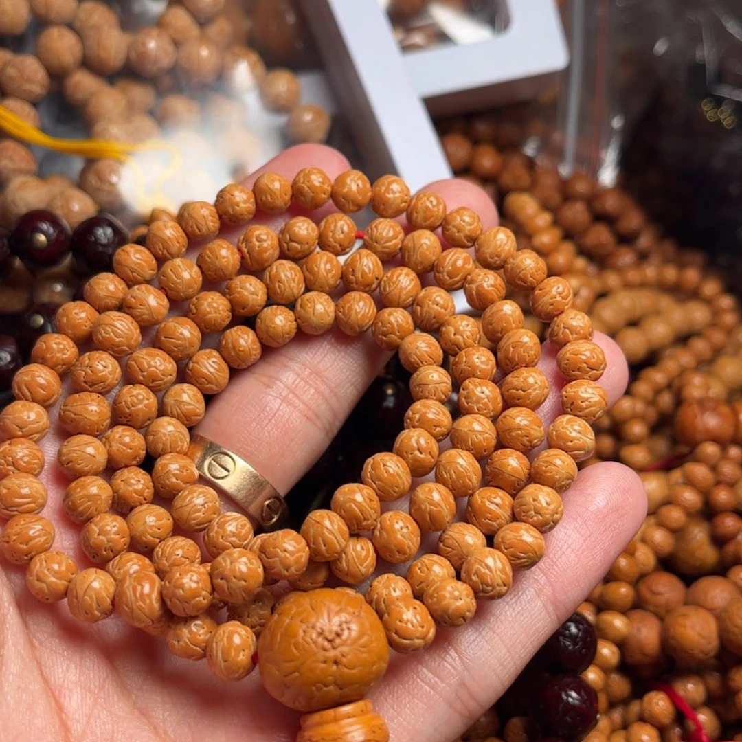 凤眼菩提吊坠金**辉凤眼