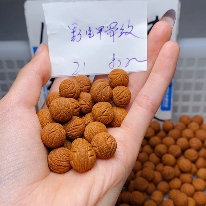 闲***致手串桃核12mm左右野生甲骨纹21颗（打孔）