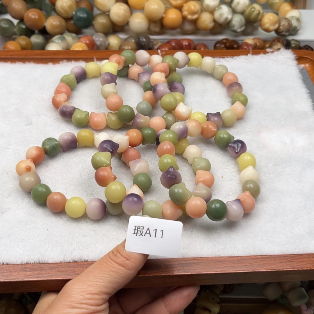 菩提根/象牙果手串瑕A11猫头11mm一串