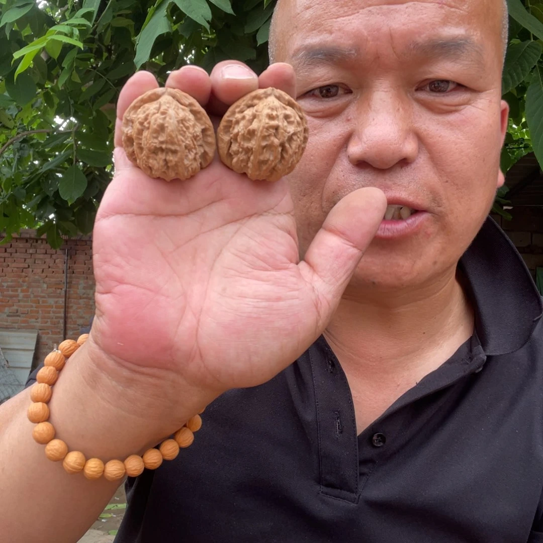 文玩核桃吊坠白狮子40