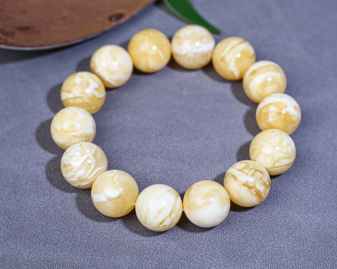 36.05 16mm琥珀蜜蜡妖花圆珠手串，蜡质浓厚 花纹漂亮，上手好看