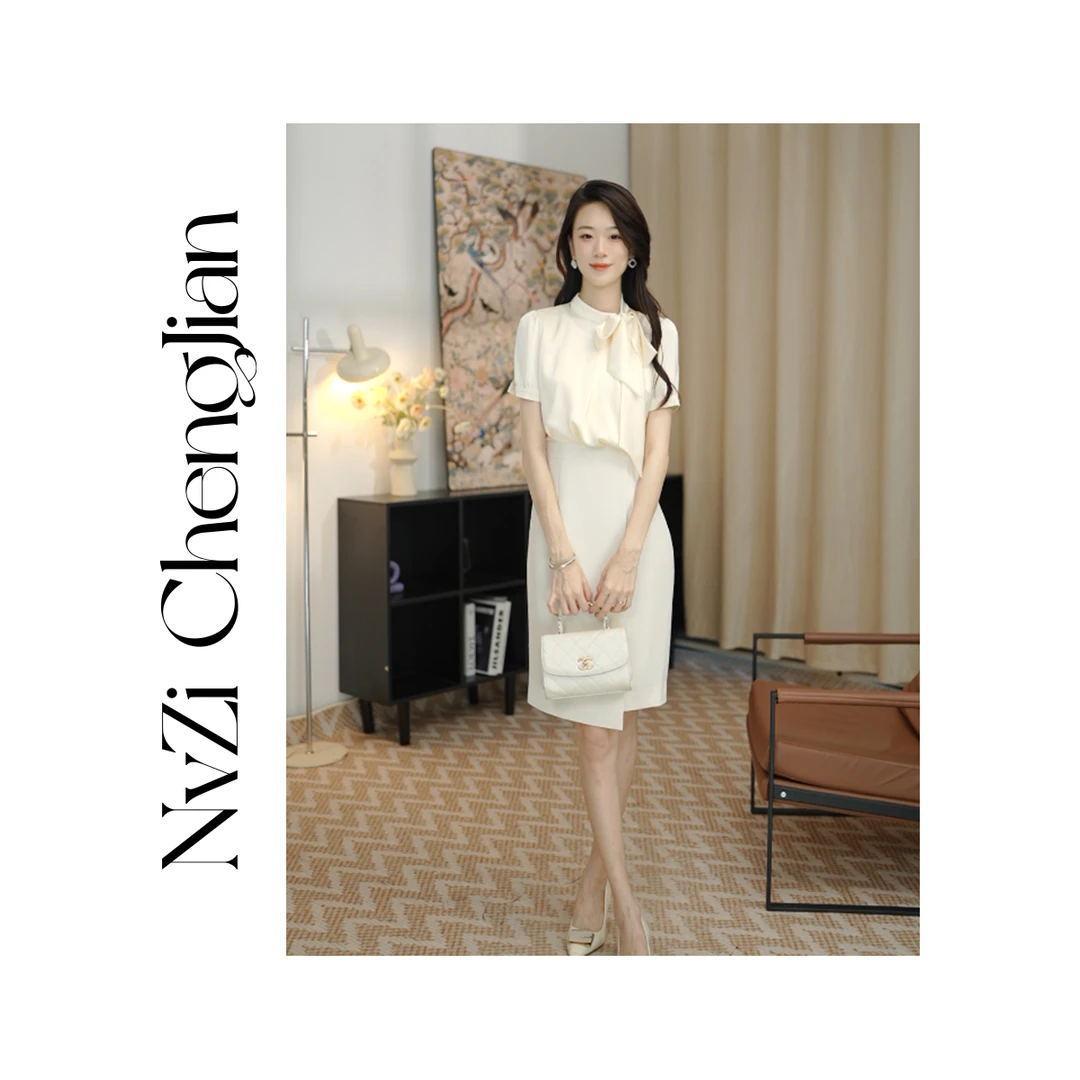 女子成鉴 气质设计感蝴蝶结飘带裙子假两件修身显瘦连衣裙D-Q1138