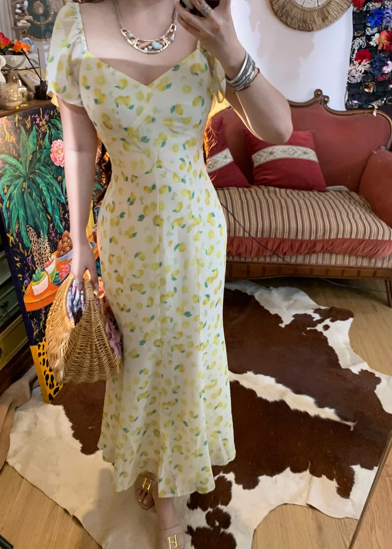 《波西塔诺》2025夏季法式清新小柠檬印花气质连衣裙长裙M166