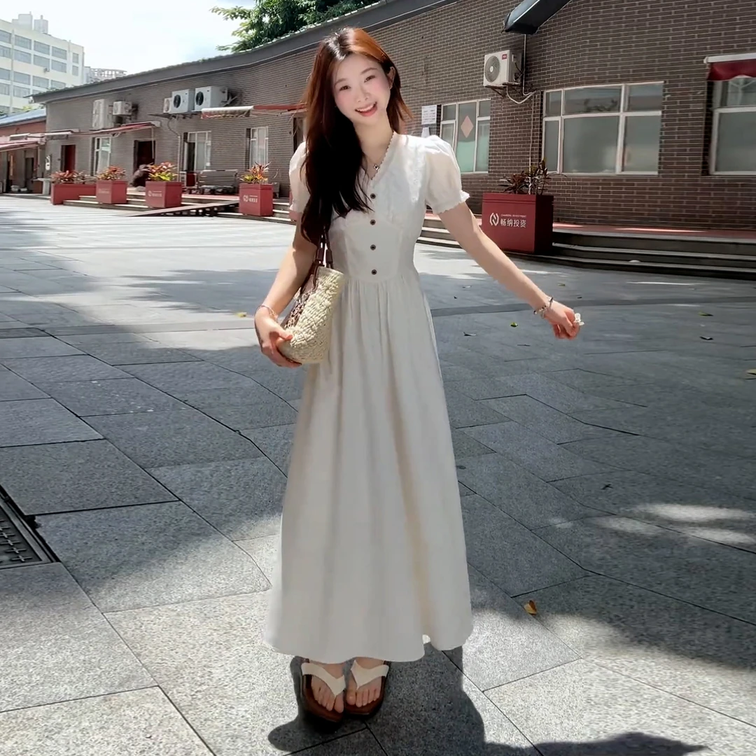 法式白色温柔气质v领连衣裙子女夏季2025新款度假高级感收腰长裙