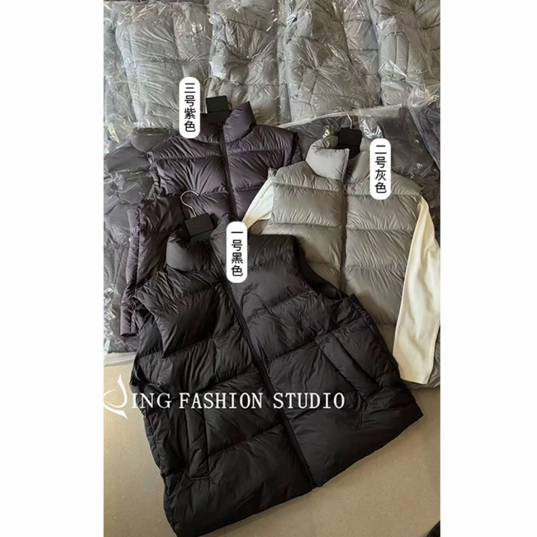 《越穿越喜欢》JlNG冬季新款33231宽松白鹅绒马甲女装保暖无袖马甲