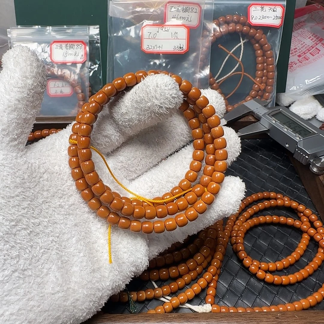 杰***橄榄核吊坠7.1mm老挝核尖极限弧108